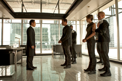 Jack Kang (Daniel Dae Kim, left), Four (Theo James, center) and Tris (Shailene Woodley) in THE DIVERGENT SERIES: INSURGENT. Photo Credit: Andrew Cooper.