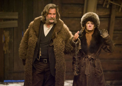 Kurt Russell and Jennifer Jason Leig h (l. to r.) in "The Hateful Eight