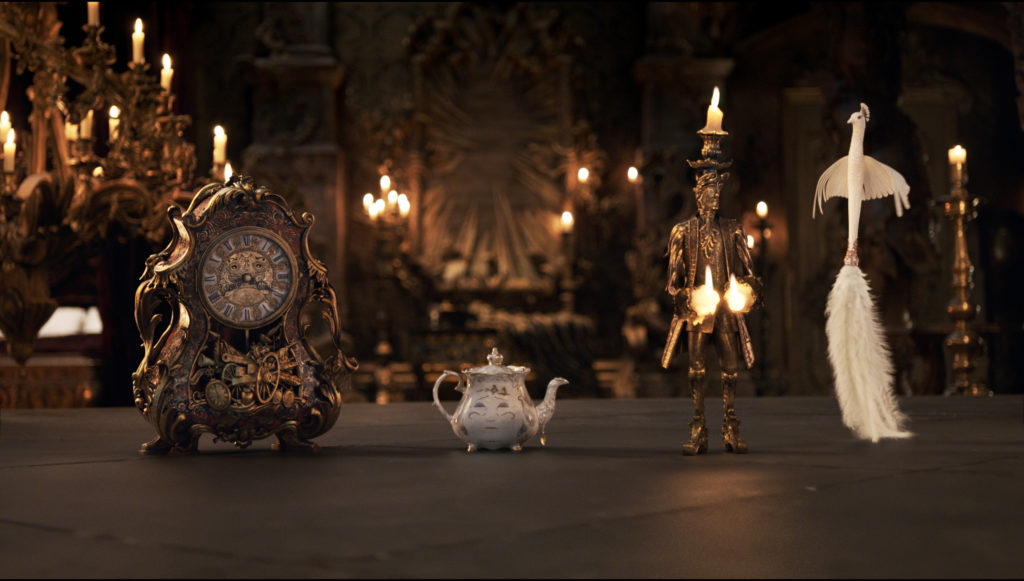 The mantel clock Cogsworth, the teapot Mrs. Potts, Lumiere the candelabra and the feather duster Plumette live in an enchanted castle in Disney's BEAUTY AND THE BEAST.